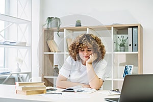 demotivated student exam study bored woman reading