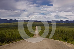 The Dempster Highway winding to Richardson Mountains