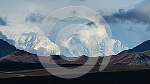 Denali mountain with clouds and snow