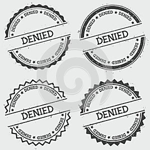 Denied insignia stamp isolated on white.