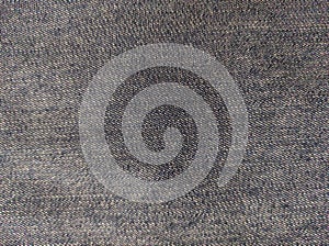 Denim.Abstract Denim Texture. Denim is a sturdy cotton warp-faced textile in which the weft passes under two or more warp threads.