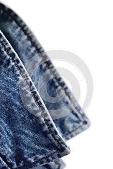 Denim indigo blue jeans jacket collar, isolated macro closeup photo