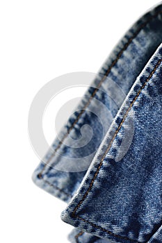 Denim indigo blue jeans jacket collar, isolated macro closeup, large detailed vertical classic bluejeans studio shot photo