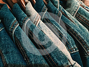 Denim jacket jacket on coat hangers