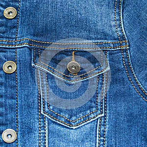 Denim jacket pocket with stitches. Casual wear. Jean jacket.