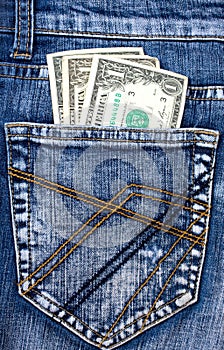 Denim jeans with money in back pocket