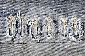 Denim jeans texture with old torn