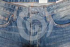 Denim texture or front of jean trouser for background