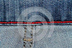 Denim texture with red seam for jeans background