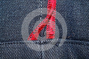Denim texture with red seam for jeans background