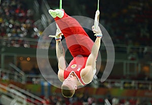 Denis Abliazin of Russian Federation competes at the Men`s Rings Final on artistic gymnastics competition at Rio 2016 Olympic Game