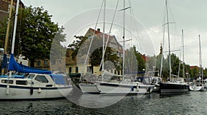 Denmark, Copenhagen, Overgaden Oven Vandet, view of the canal and yachts near the pier from the ship