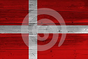 Denmark flag painted on old wood plank