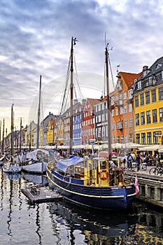 Denmark - Zealand region - Copenhagen city center - panoramic view of the Nyhavn district with boats and tenement houses along the