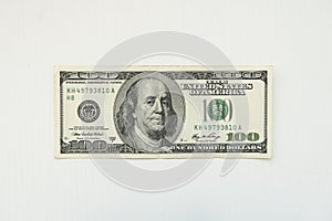 denomination one hundred dollars bill on white background. the old design of the American 100 dollar bill