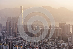 Dense high rise apartments in Kowloon peninsula view from Beacon Hill in the evening, Hong Kong