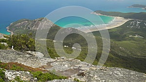 Dense jungle forest, mountains and blue turquoise water in Wilsons prom, Australia, dolly in