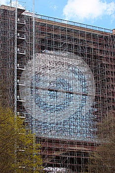 Dense scaffolding on a bridge as a construction background