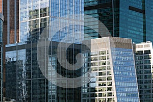 Dense standing buildings of business area in Moscow City International Business Centre skyscrapers front view closeup