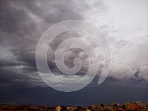 Dense Storm Clouds Over The City. photo