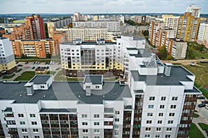 Dense urban development. A modern area of the city with beautiful multi-colored multi-storey buildings. Top view of the sleeping