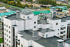 Dense urban development. A modern area of the city with beautiful multi-colored multi-storey buildings. Top view of the sleeping