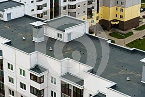 Dense urban development. A modern area of the city with beautiful multi-colored multi-storey buildings. Top view of the sleeping