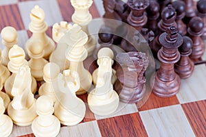 Densely packed chess pieces on the chessboard