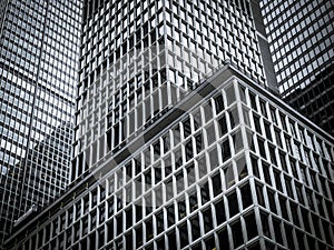 Densely packed skyscrapers and buildings in New York City on an overcast day in a geometric pattern