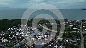 Densely populated poor village near the sea in Bohol, Philippines.