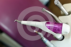 Dental air flow equipment for teeth cleaning.