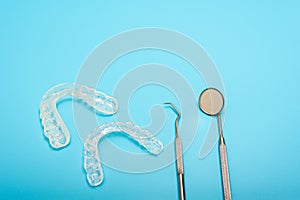 Dental aligner used by dental doctors  on blue background