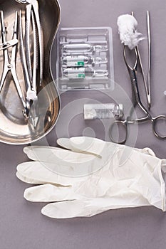 Dental appliances in sterile packaging on grey background