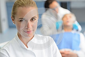 Dental assistant closeup dentist checkup patient