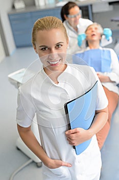 Dental assistant dentist checkup patient