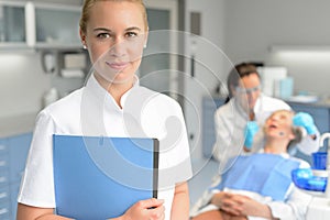 Dental assistant dentist checkup woman patient