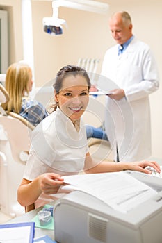 Dental assistant prepare patient personal document