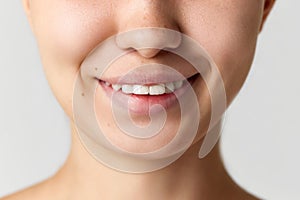 Dental care. Cropped image of female face. Young woman smiling, Teeth whitening, freshness