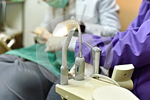 Dental care equipment, Background of dentist examining and doing teeth treatment in dental clinic.