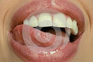 Dental care, healthy teeth and smile, white teeth in mouth. Closeup of smile with white healthy teeth. Open mouth