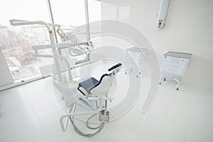 Dental clinic interior with modern dentistry equipment, dentist surgery work place