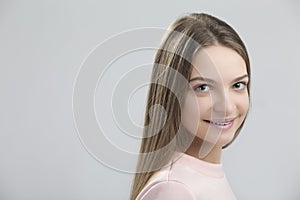 Dental Concepts. Portrait of Happy Teenage Female With Teeth Braces