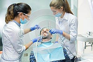 Dental doctors with patient.
