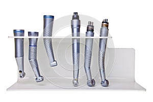 Dental drill tools on stand.