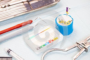 dental equipment and instruments on a sterile table. root canal treatment instruments photo