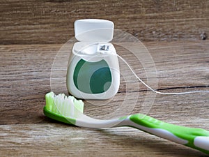 Dental floss and toothbrush