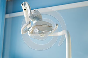 Dental health care concept background - Dental handle lamp close up. Dentistry and stomatology equipment