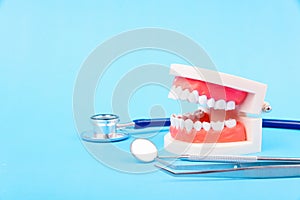 Dental Hygiene Health Concept, White tooth and Dentist tools for dental care