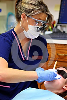 Dental Hygienist At Work