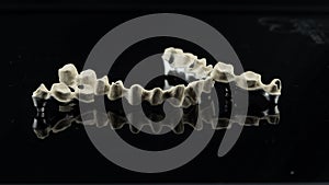 Dental implants on a black background